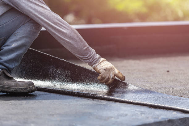 Professional Basement Waterproofing technician working in Hohenwald, TN